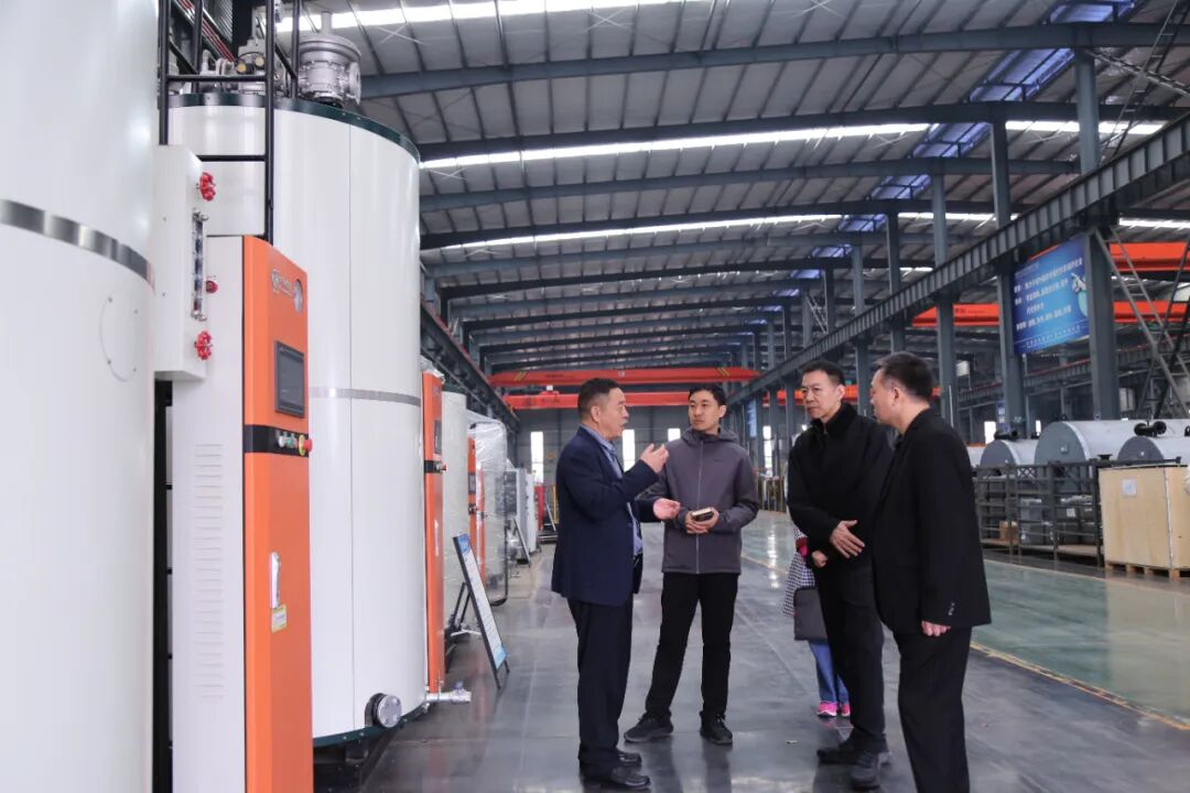 河南日报周口分社社长王映一行到四通锅炉参观调研